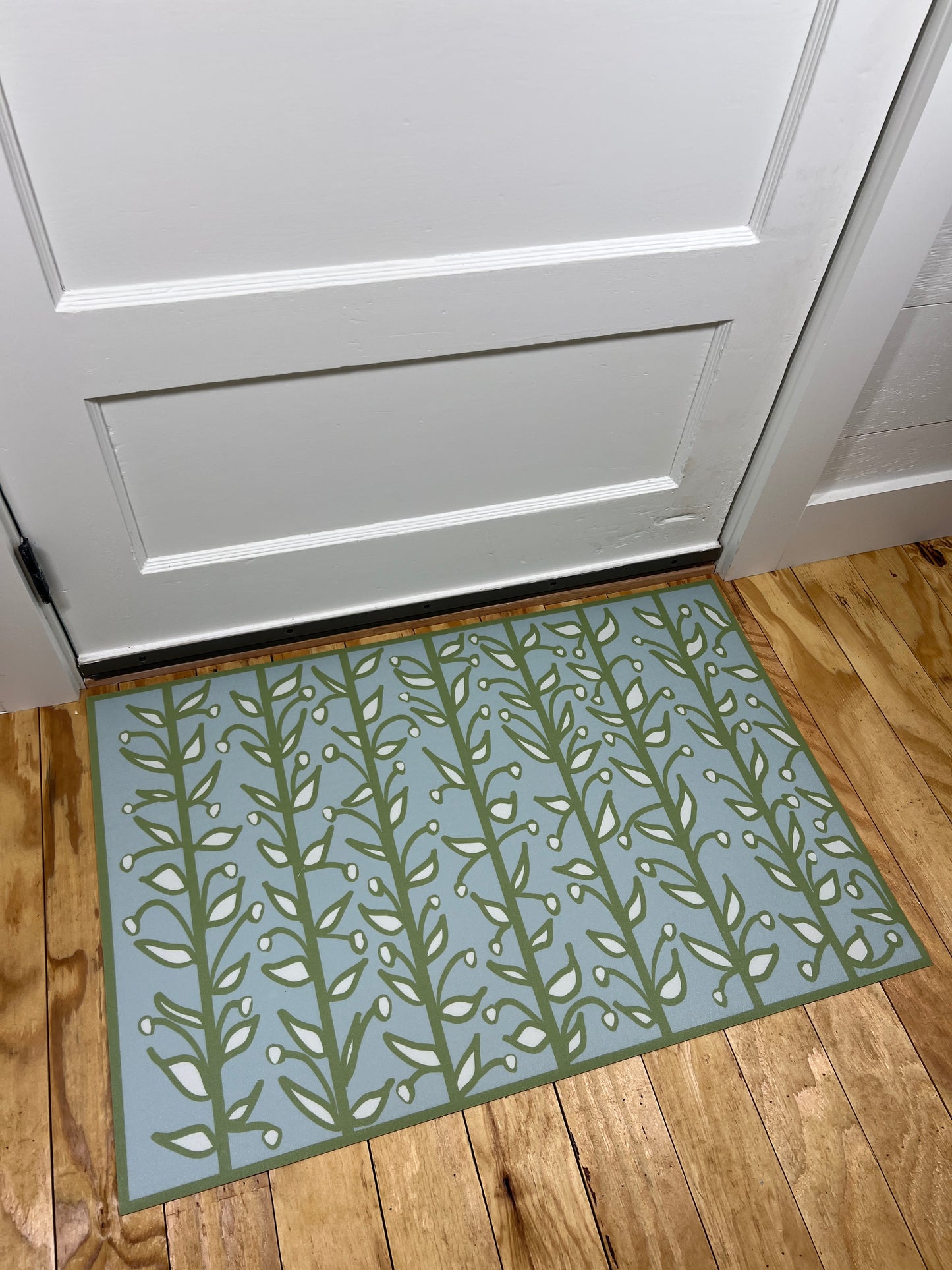 "Whoville" in Blue Green Fun Floral Vine Vinyl Mat- 24"x36"