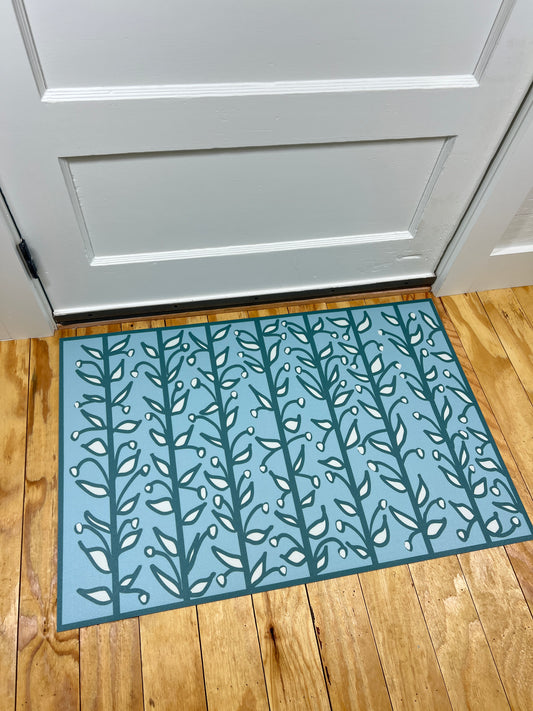 "Whoville" in Teal Fun Floral Vine Vinyl Mat- 24"x36"