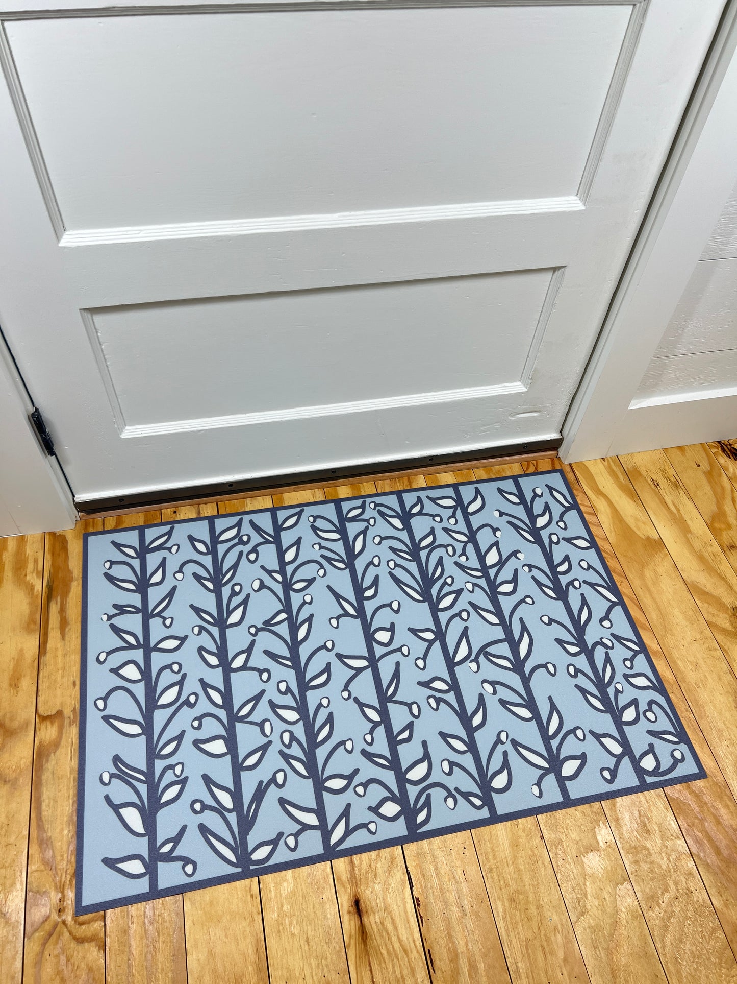 "Whoville" in Navy Fun Floral Vine Vinyl Mat- 24"x36"